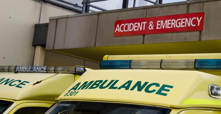 A fleet of ambulances parked outside and accident and emergency unit